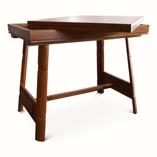 Oak flip-top game table with raised tabletop, open interior, and wood sliding top section.