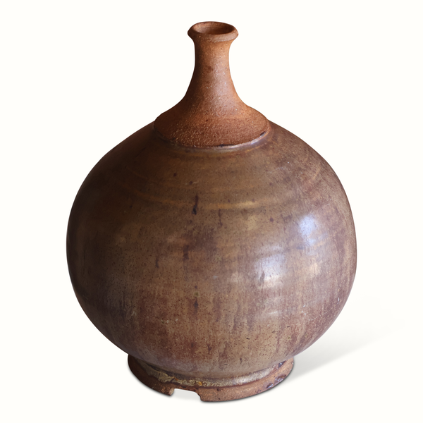 Handmade pottery vase, narrow neck and round body, rust-brown glazed finish.