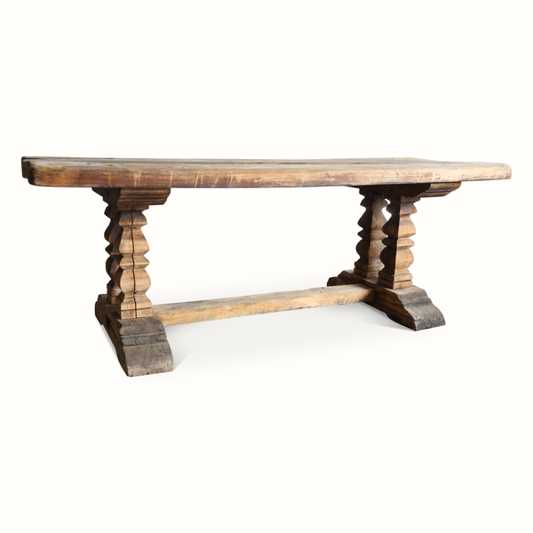 Rustic farm table with rectangular top and crossed apron-like lower support