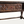 Carved oak table apron close-up with star and diamond relief patterns