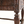Carved oak table corner with ornate carvings and turned leg detail