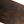 Carved oak table top board with dark brown worn patina and visible wood grain