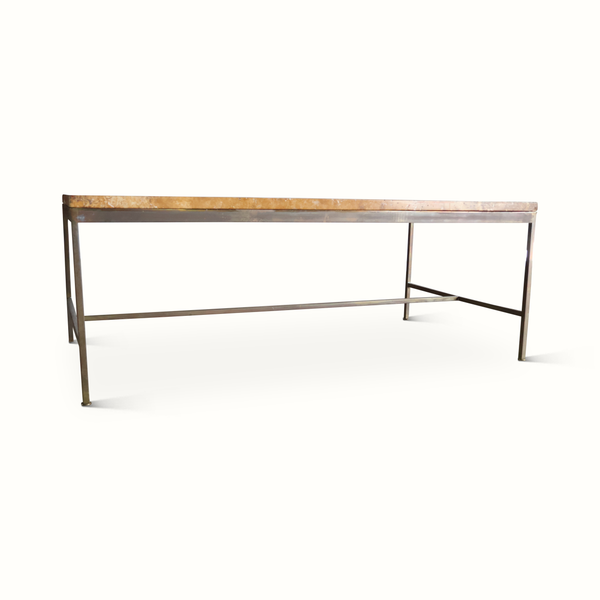 Coffee table with brown stone top and dark metal frame, open crossbar design