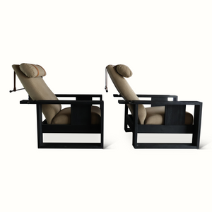 Pair of recliner armchairs, beige seats, dark frames, rounded headrests