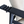 Reclining armchair hardware: dark lever and wood arm beside beige cushion