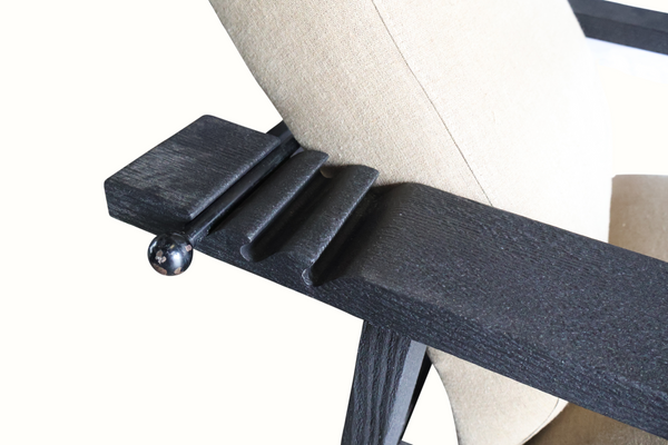 Reclining armchair hardware: dark wood arm with chrome ball lever