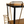 Bar cart corner detail: black legs, brass frame, wire side rack, wood shelf