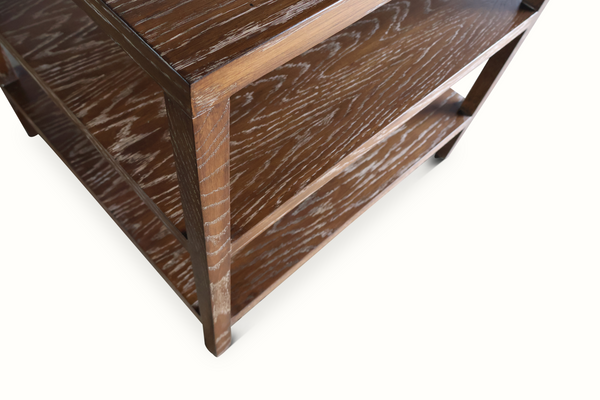 Tiered table corner with straight legs and distressed wood grain finish