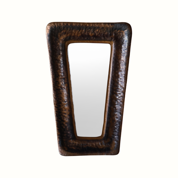 Vintage copper wall mirror with textured dark frame, arched rectangular shape