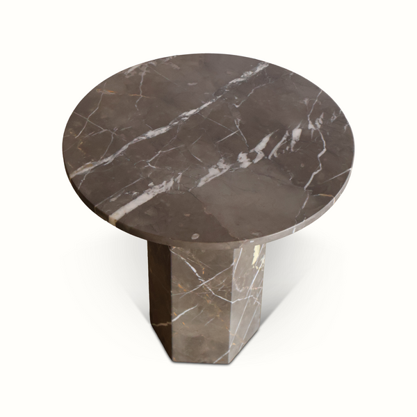 Round dark marble side table with white veining on top and column base
