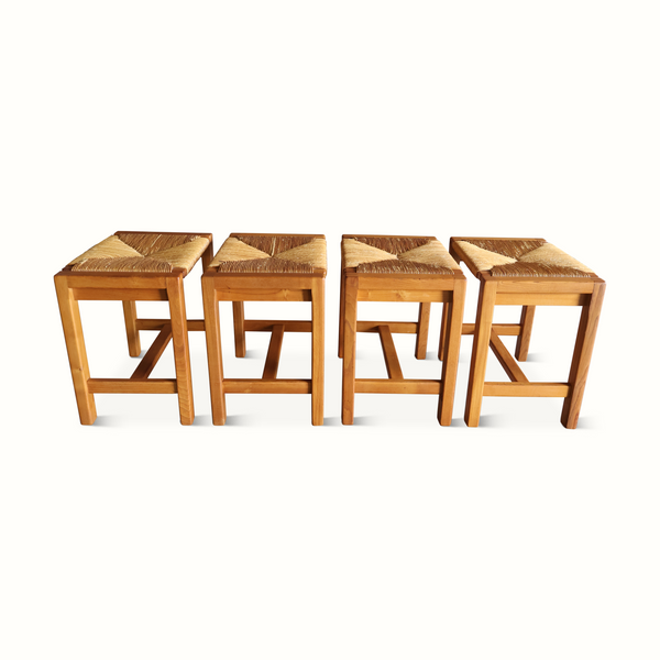 Set of four natural wood rush stools with woven square seats and angled legs