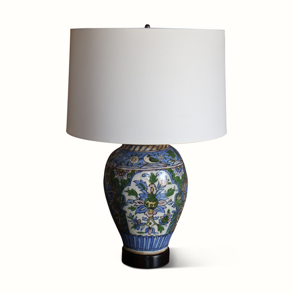 Floral ceramic vase table lamp with white drum shade, blue-green scroll pattern, dark base
