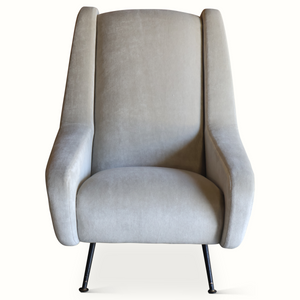 Mid-century lounge chair front view, light blue seat with tall brown side panels and black legs