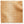 Gold ikat-style fabric pillow cover with abstract cream stripe pattern