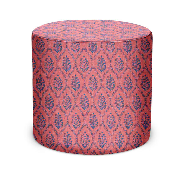 Indoor pouf with indigo jaali pattern on raspberry fabric, round upholstered stool