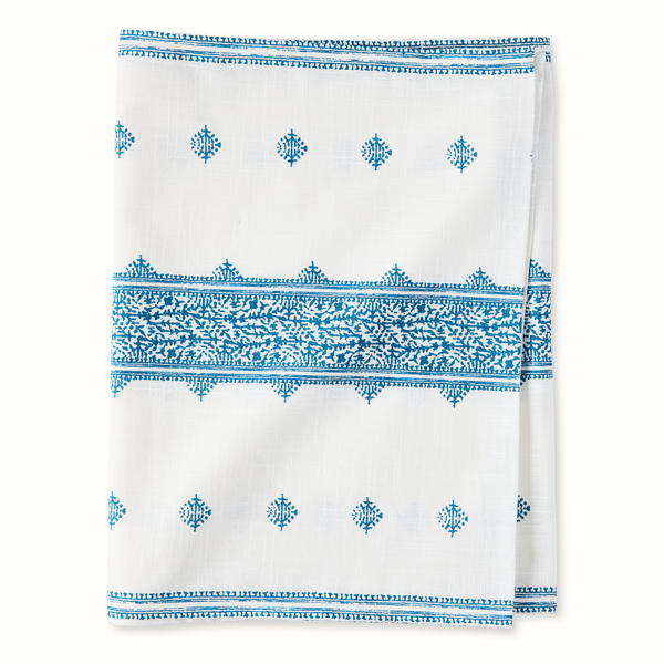 White runner with blue stripe and repeating medallion print