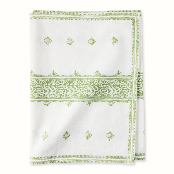 Green-and-white printed runner with border stripes and small motif pattern