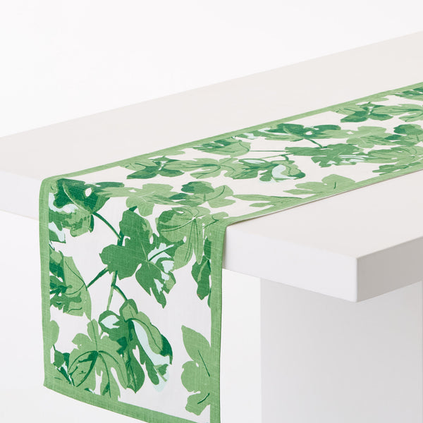 Green fig leaf printed runner with green border and angled corner