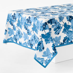 Blue leaf-printed tablecloth with draped corners