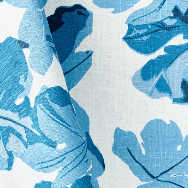 Blue fig leaf pattern printed tablecloth fabric close-up