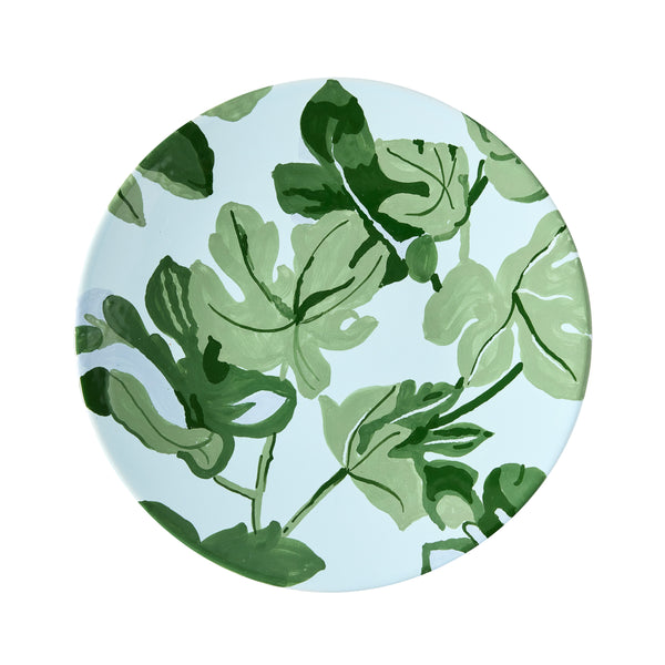 Hand-painted salad plate with green fig leaf pattern on light blue base