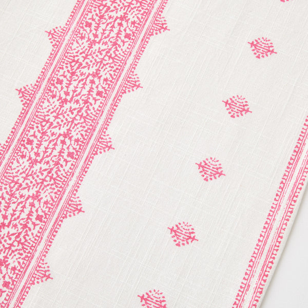 White runner with pink repeating motif print and stripe trim
