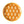 Orange melamine salad plate with yellow rim and white teardrop pattern