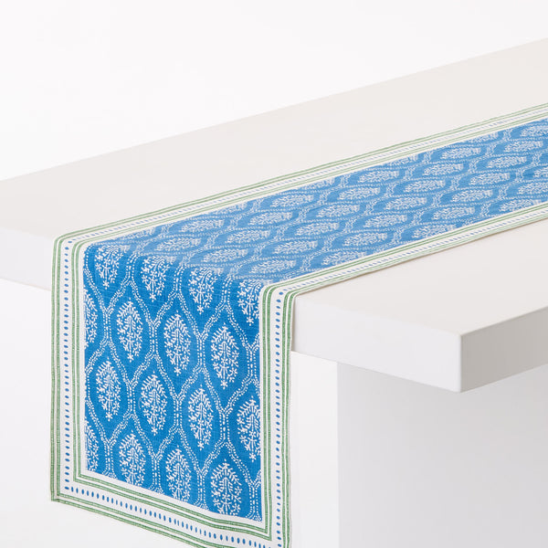 Blue jaali printed runner with green border and corner trim