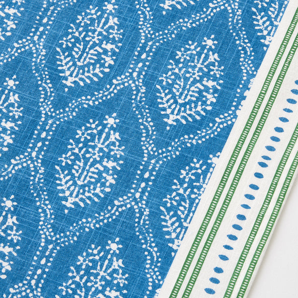 Blue jaali pattern runner close-up with white motifs and green edge stripe