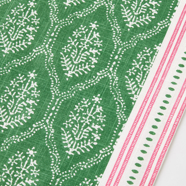 Green jaali printed runner with white motifs and pink border trim