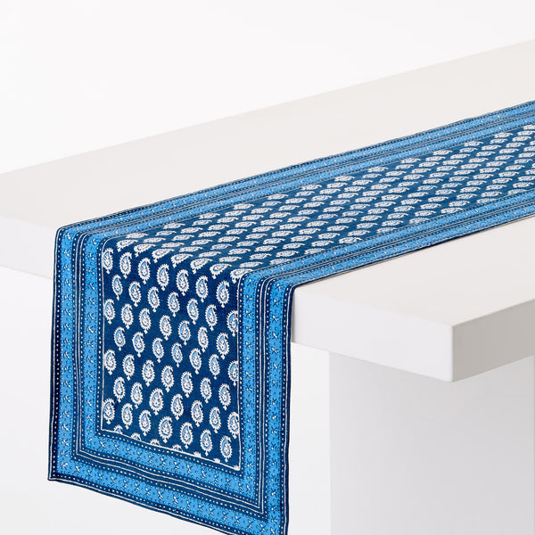 Blue printed runner rug with medallion pattern and dark border trim
