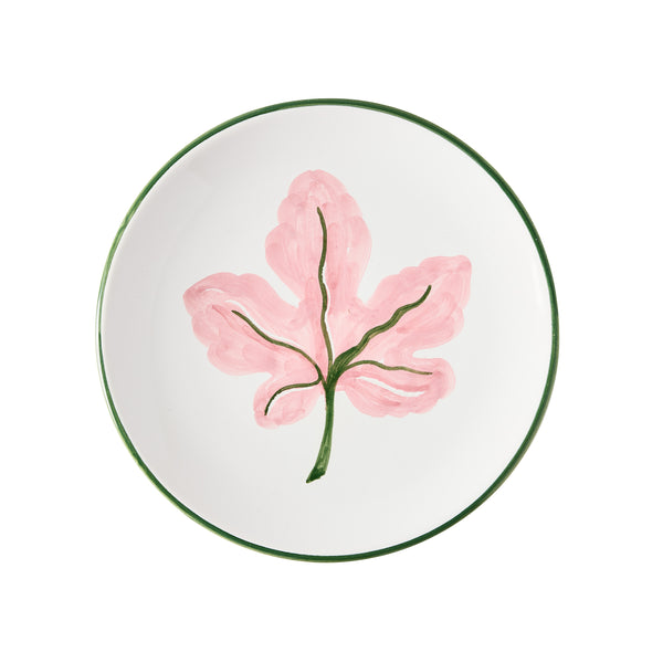 Hand-painted pink fig appetizer plate with green rim and pink floral fig design.