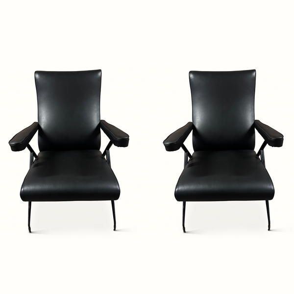 Pair of black leather reclining armchairs, padded arms and seat, with black metal legs
