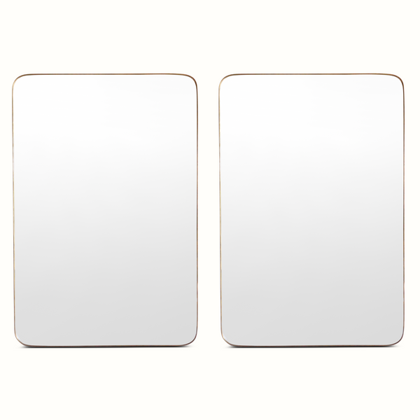 Two wall mirrors with rounded-rectangle shapes and brass-toned frames