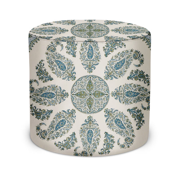 Indoor pouf with round seat, white base and blue-green ornate paisley pattern