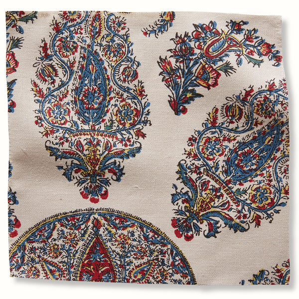 Peter Dunham Textiles pillow cover in cream with red and blue ornate paisley medallion print