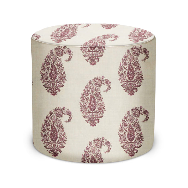 Round indoor pouf ottoman in natural fabric with burgundy paisley pattern