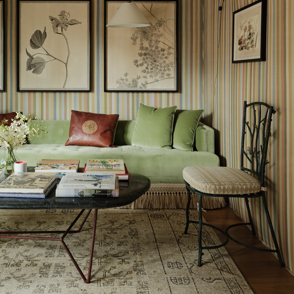 Faux bois metal side chairs with dark frame and patterned fabric seat cushions