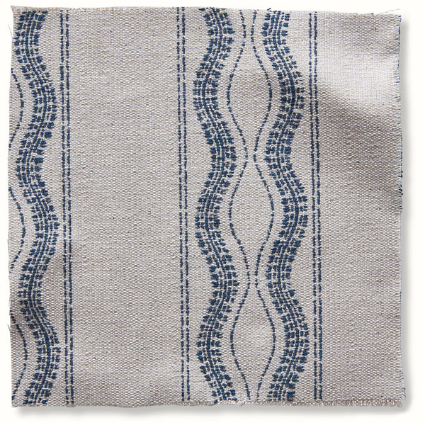 Outdoor pillow cover fabric with natural base and blue striped medallion pattern