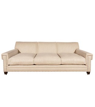 A customizable sofa with nailhead detail, designed by Peter Dunham for hollywood at Home, handmade in Los Angeles.