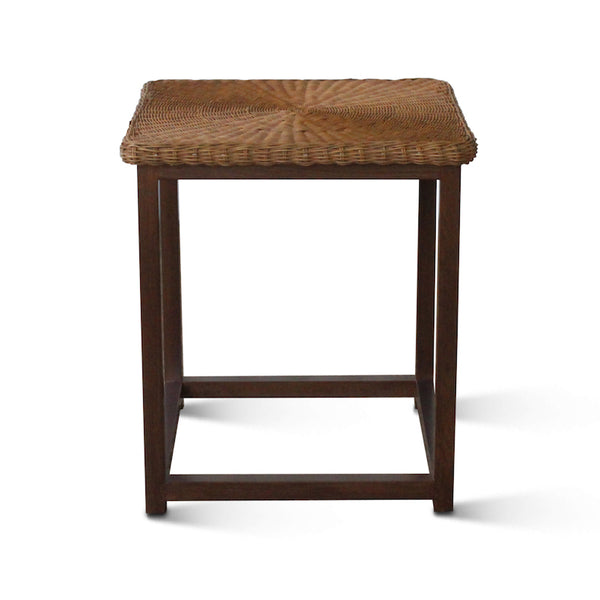 Woven wicker side table top on a dark walnut frame with open shelf.