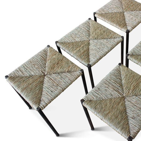 Rush and metal stools set with woven square seats and dark metal frames