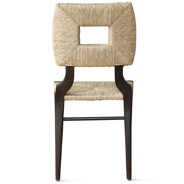 A dining side chair of our iconic handmade How to Marry A Millionaire chair, a reedition of a chair our founder Peter Dunham bought at a Hollywood memorabilia auction and attributed to legendary designer T. H. Robsjohn-Gibbings.