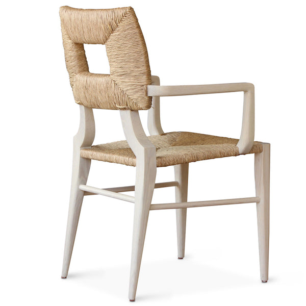 The dining armchair version of our iconic handmade How to Marry A Millionaire chair, a reedition of a chair our founder Peter Dunham bought at a Hollywood memorabilia auction and attributed to legendary designer T. H. Robsjohn-Gibbings.