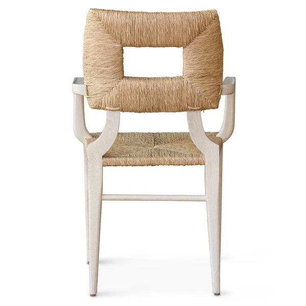 The dining armchair version of our iconic handmade How to Marry A Millionaire chair, a reedition of a chair our founder Peter Dunham bought at a Hollywood memorabilia auction and attributed to legendary designer T. H. Robsjohn-Gibbings.