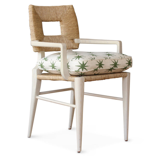 The dining armchair version of our iconic handmade How to Marry A Millionaire chair, a reedition of a chair our founder Peter Dunham bought at a Hollywood memorabilia auction and attributed to legendary designer T. H. Robsjohn-Gibbings.