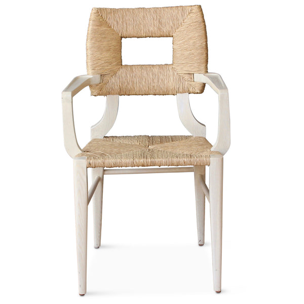 The dining armchair version of our iconic handmade How to Marry A Millionaire chair, a reedition of a chair our founder Peter Dunham bought at a Hollywood memorabilia auction and attributed to legendary designer T. H. Robsjohn-Gibbings.