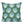 A decorative pillow or cushion made from Peter Dunham Textiles linen tribal print, Bukhara in green/blue